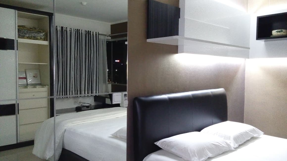 Suasana kamar dan fasilitas di Kos Tentram